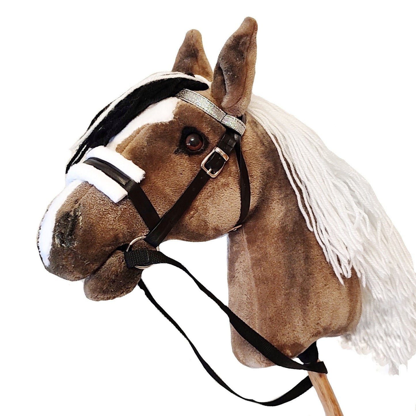 Brown chestnut hobby horse on a stick with ligth mane and black forelock, bridle and realistic brown eyes. Handmade hobbyhorse for kids from 4 years.